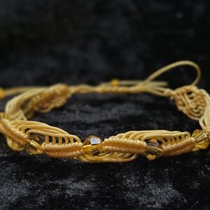 Elegant Gold Braided Bracelet